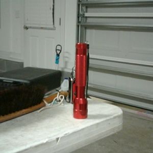 A red flashlight